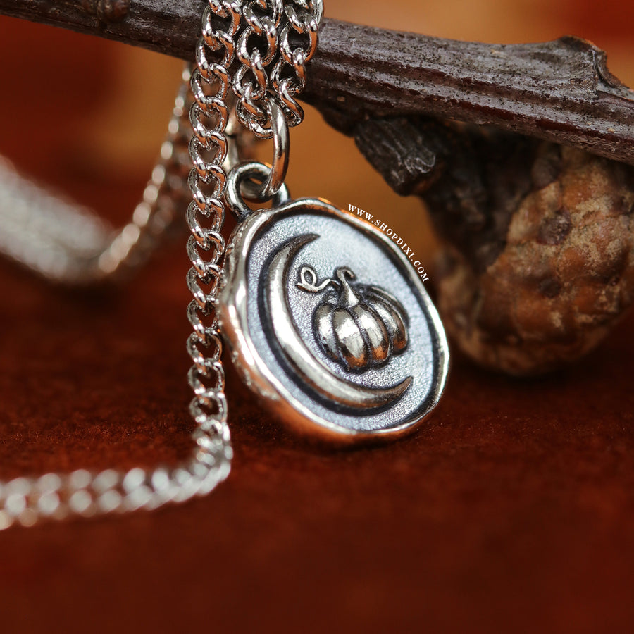 Autumn-inspired pumpkin crescent moon wax seal necklace for witchy practical magic lovers